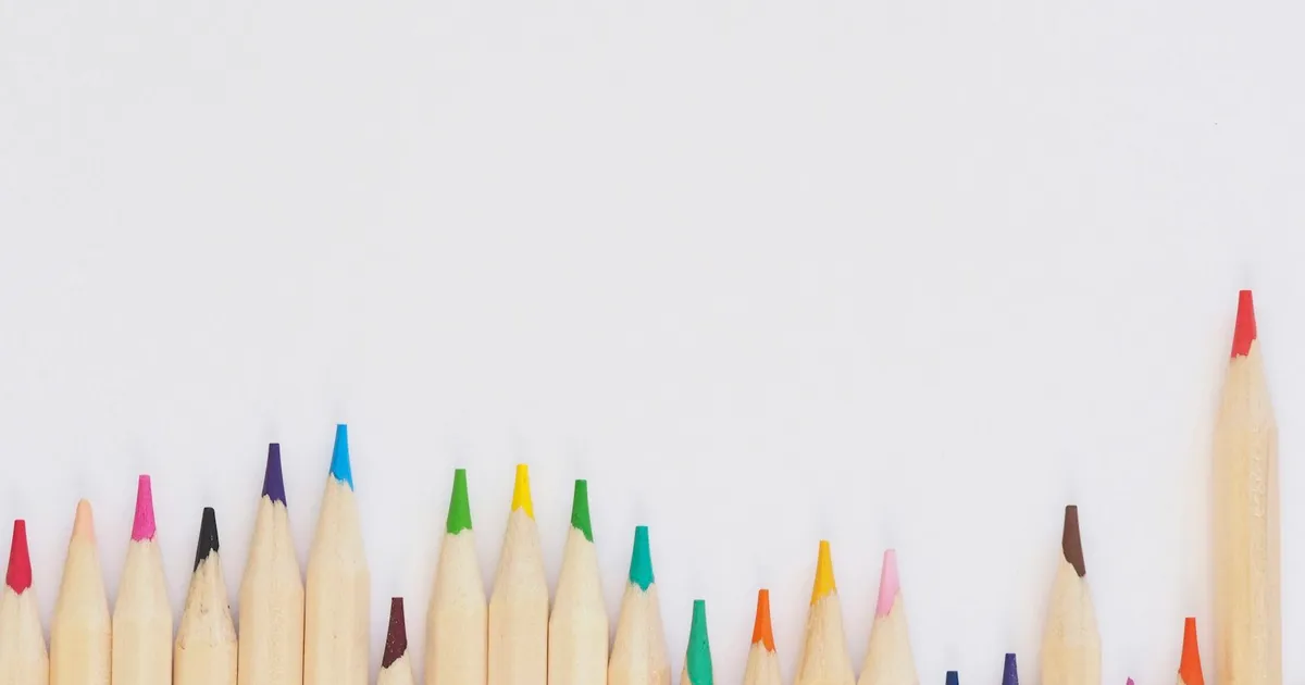 Book cover design workspace with color palettes, typography samples, and layout sketches for indie authors
